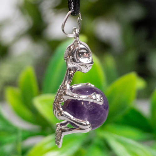 Skeleton Holding Purple Fluorite Sphere Necklace